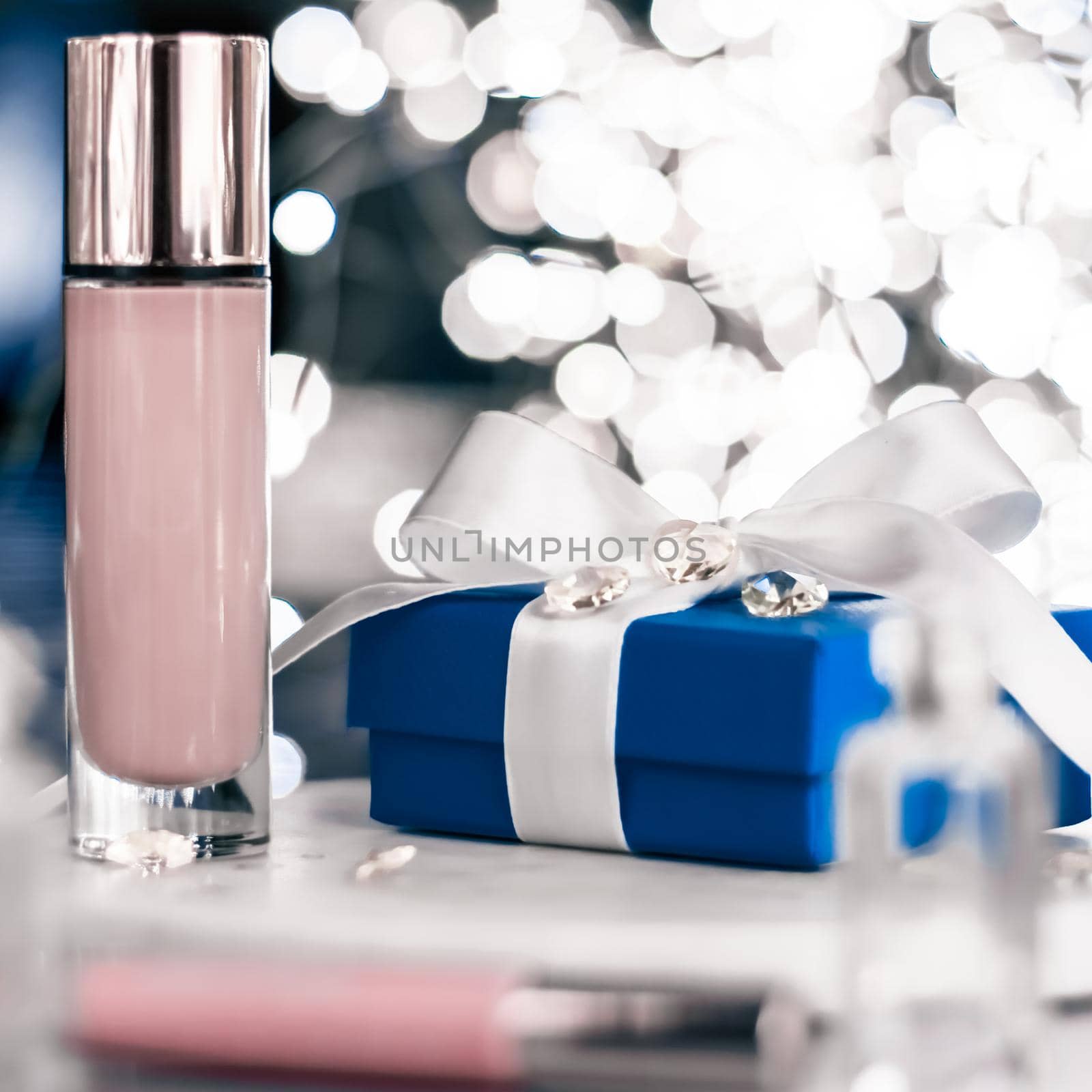 Holiday make-up foundation base, concealer and blue gift box, luxury cosmetics present and blank label products for beauty brand design by Anneleven