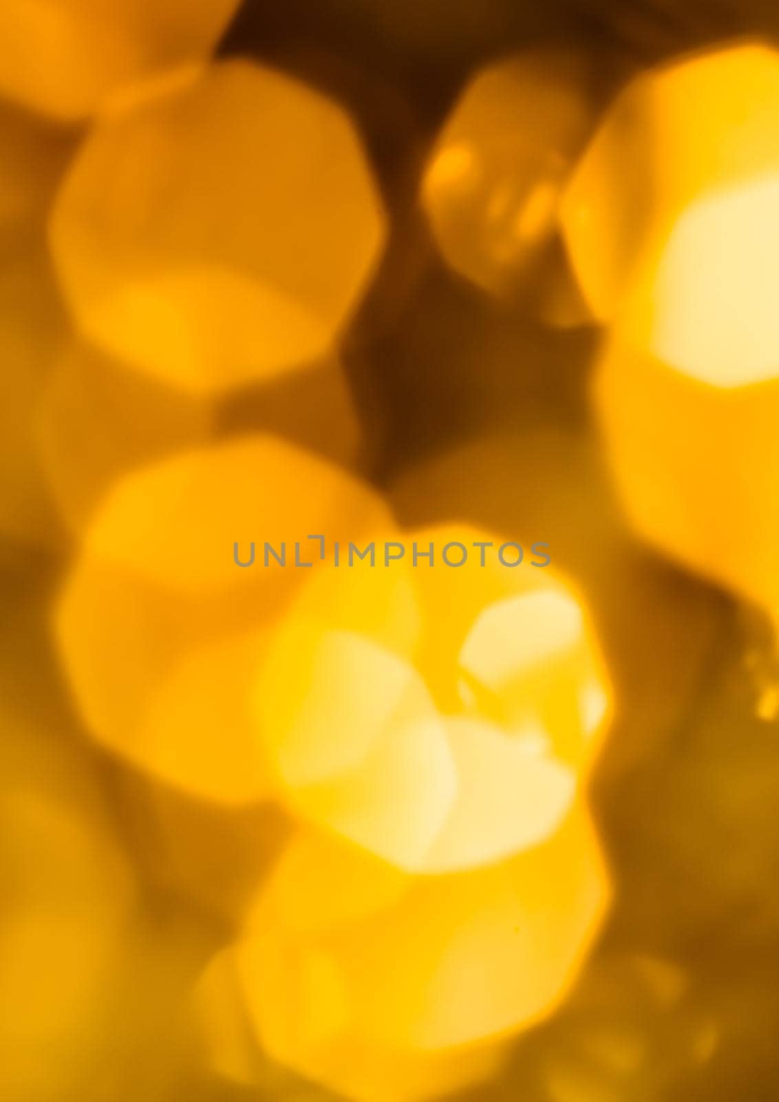 Golden Christmas lights, New Years Eve fireworks and abstract texture concept - Glamorous gold shiny glow and glitter, luxury holiday background