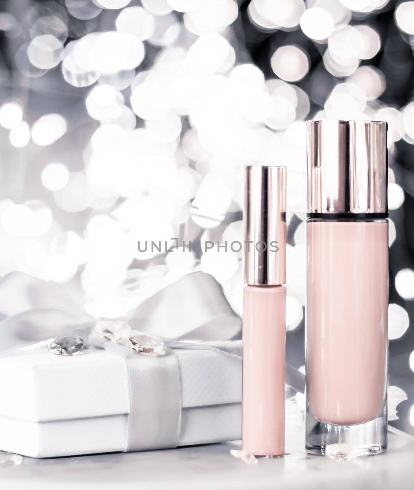 Cosmetic branding, Christmas glitter and girly blog concept - Holiday make-up foundation base, concealer and white gift box, luxury cosmetics present and blank label products for beauty brand design