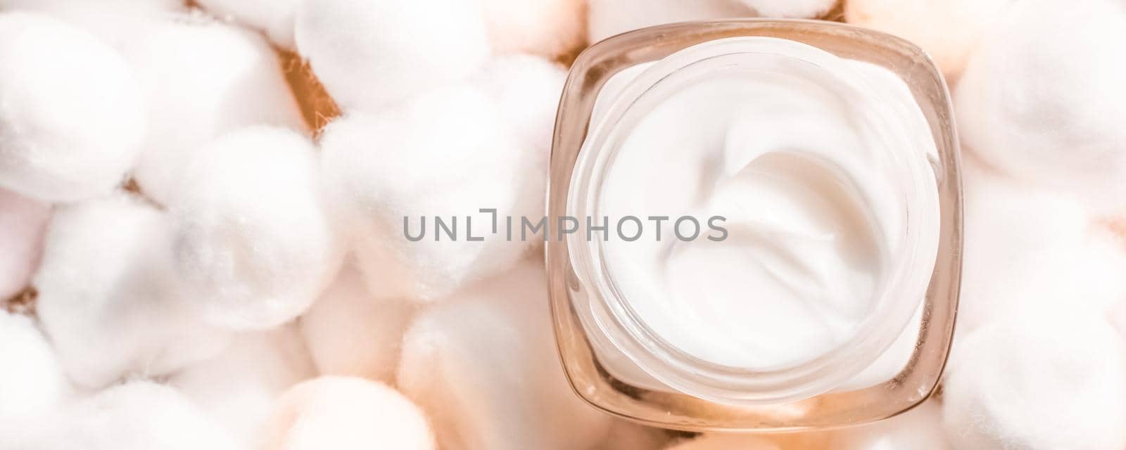 Luxury face cream for sensitive skin and orange cotton balls on background, spa cosmetics and natural skincare beauty brand product by Anneleven