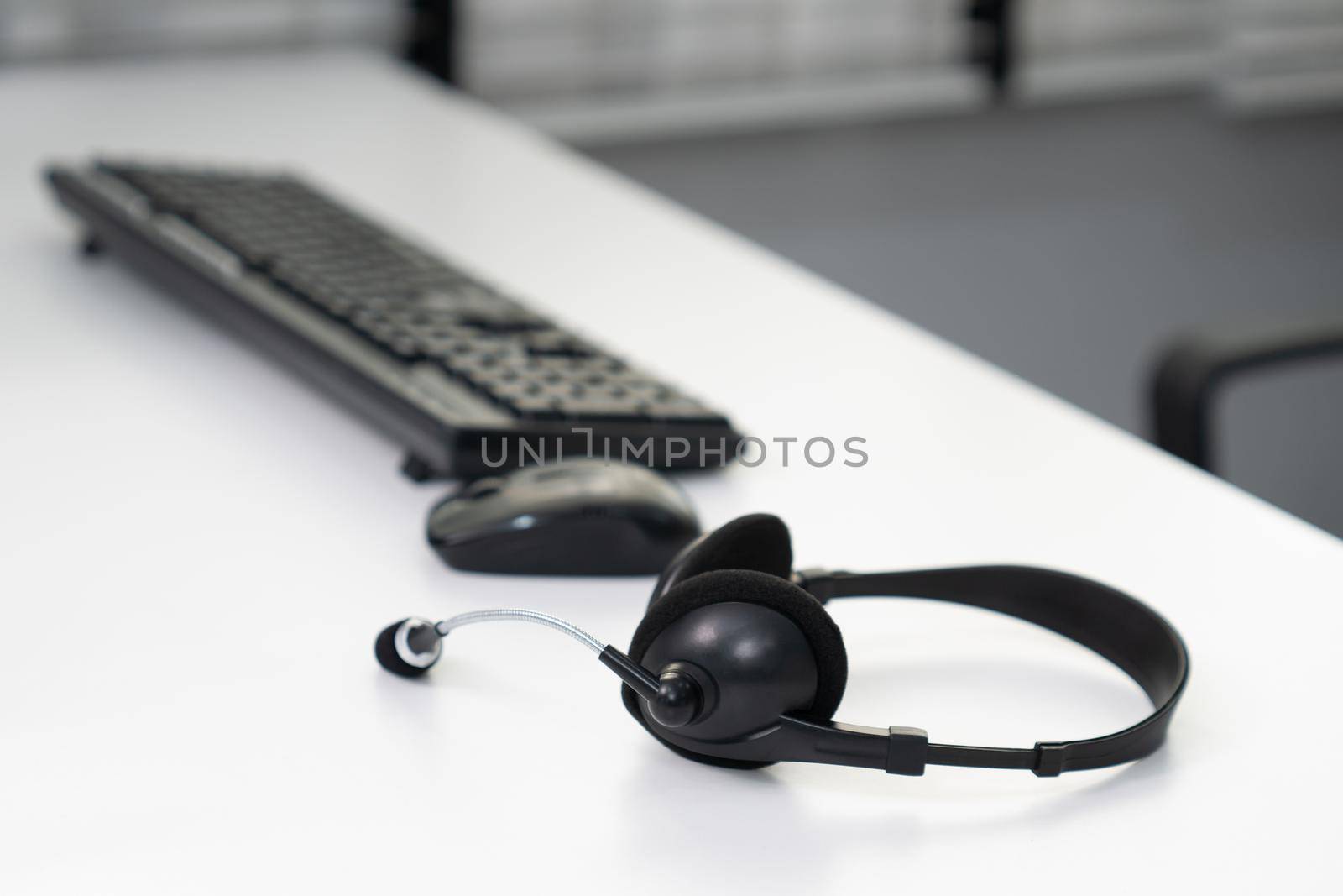 Close up image of headphones for competent online working. Customer service operator equipments.