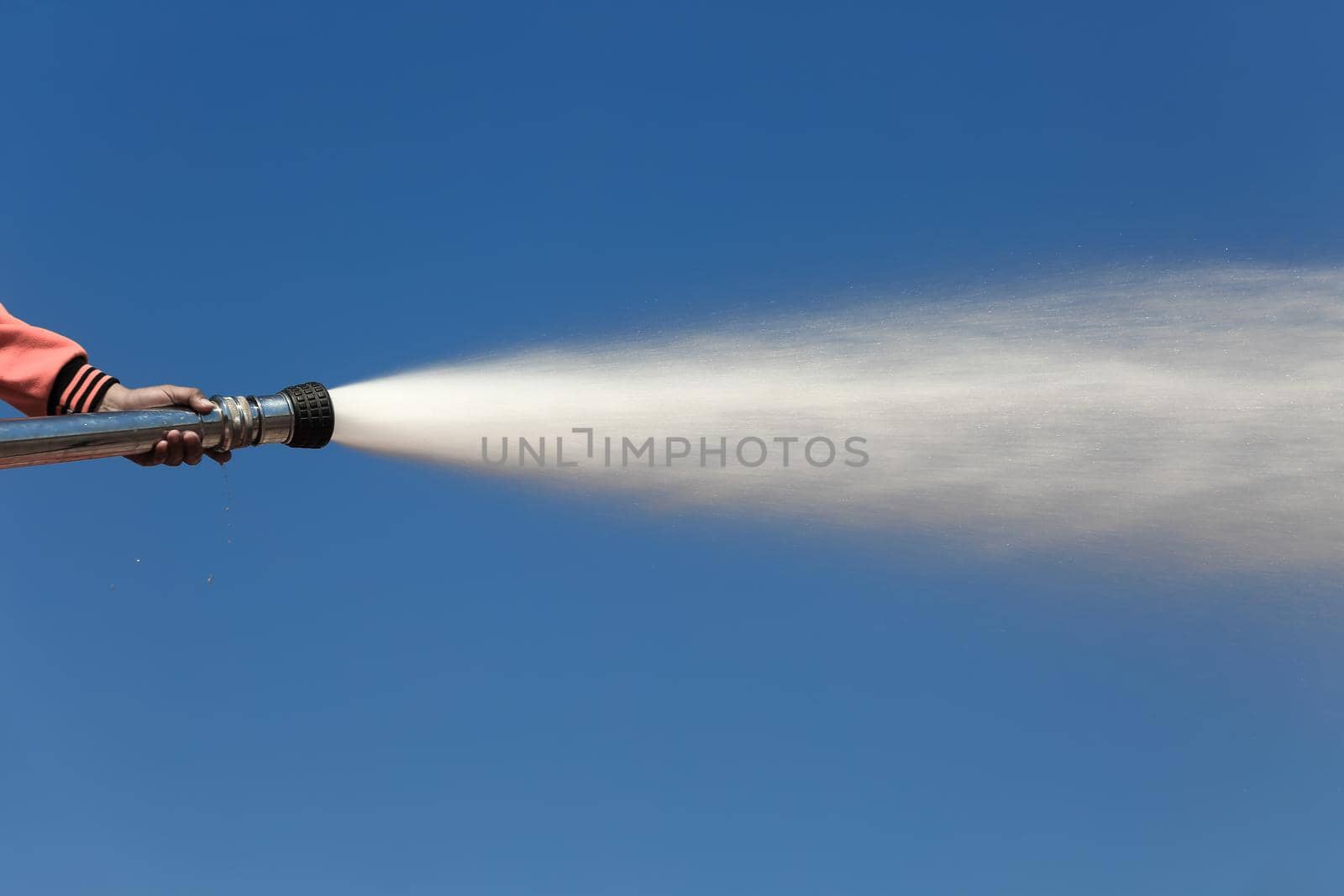 Spray water on truck during fire training in the industry by toa55