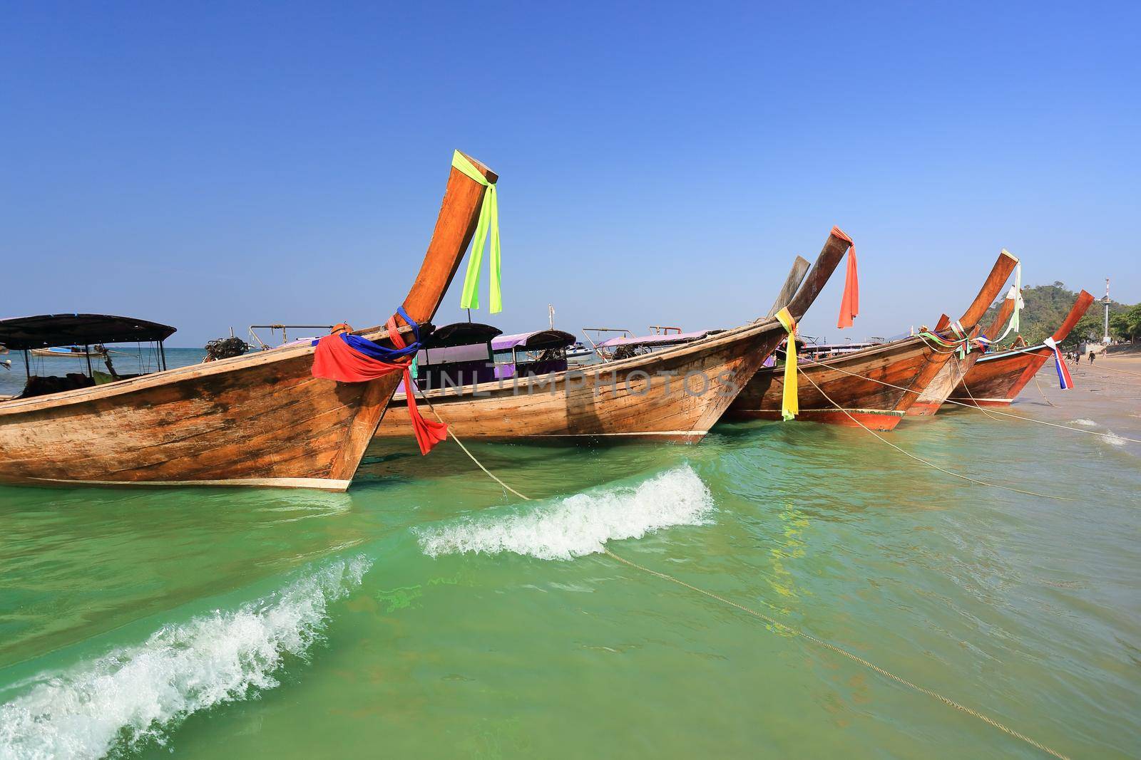 Longtail boats at  Ao Nang beach,  Krabi , Thailand by toa55
