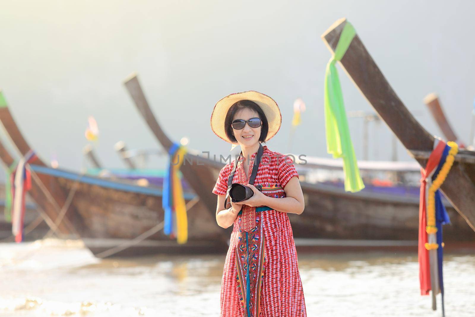 Tourist woman enjoying travel vacation in Krabi, Thailand.
