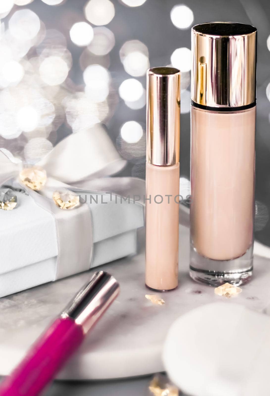 Cosmetic branding, Christmas glitter and girly blog concept - Holiday make-up foundation base, concealer and white gift box, luxury cosmetics present and blank label products for beauty brand design