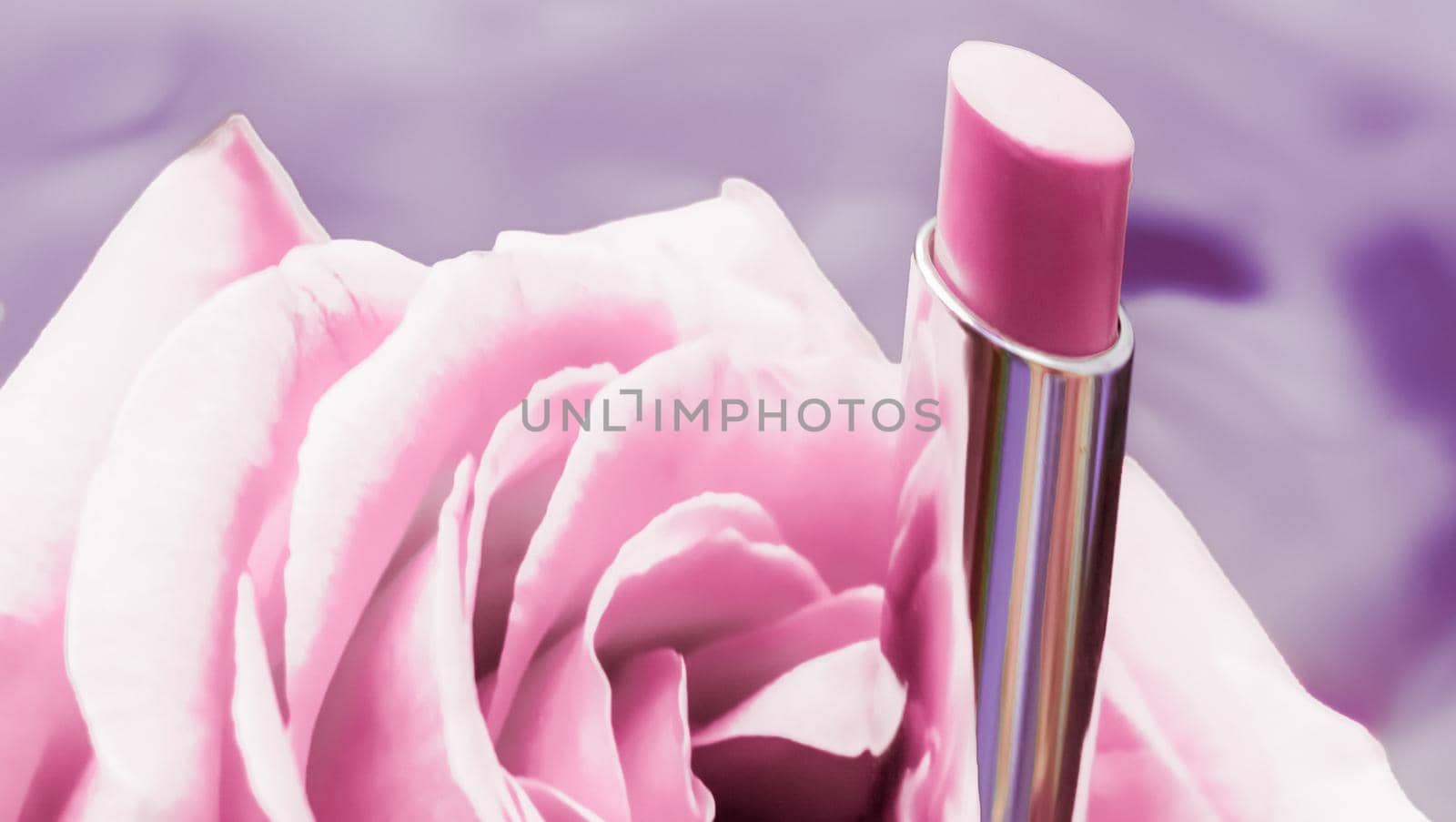 Cosmetic branding, luxe and fashion concept - Pink lipstick and rose flower on liquid background, waterproof glamour make-up and lip gloss cosmetics product for luxury beauty brand holiday design