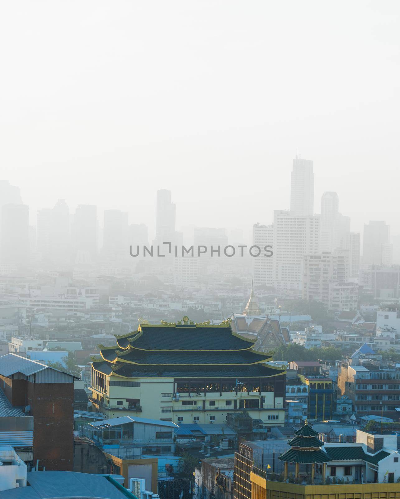 Downtown skyscrapers of the city of Bankok. Poor visibility, smog, caused by dust and smoke high level PM2.5  air pollution. by toa55