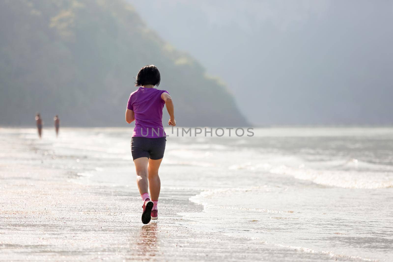 Fitness runner woman on ao nang beach  Krabi  Thailand