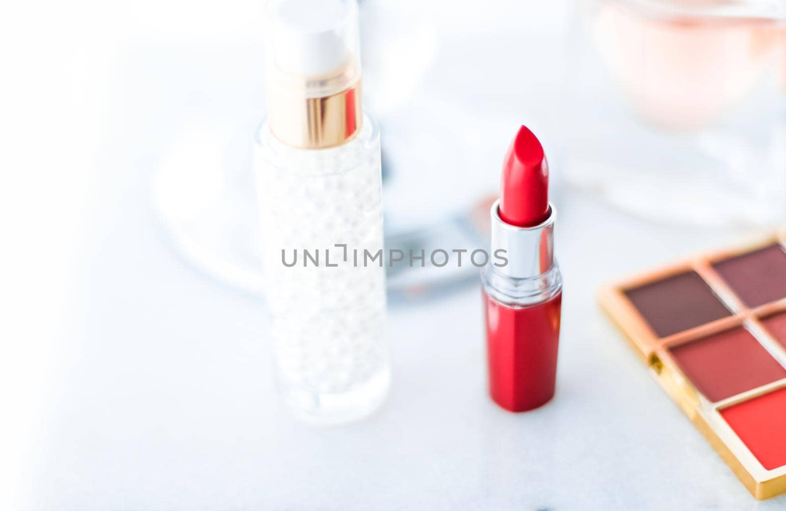 Cosmetic branding, girly and glamour concept - Cosmetics, makeup products on dressing vanity table, lipstick, foundation base, nailpolish and eyeshadows for luxury beauty and fashion brand ads design