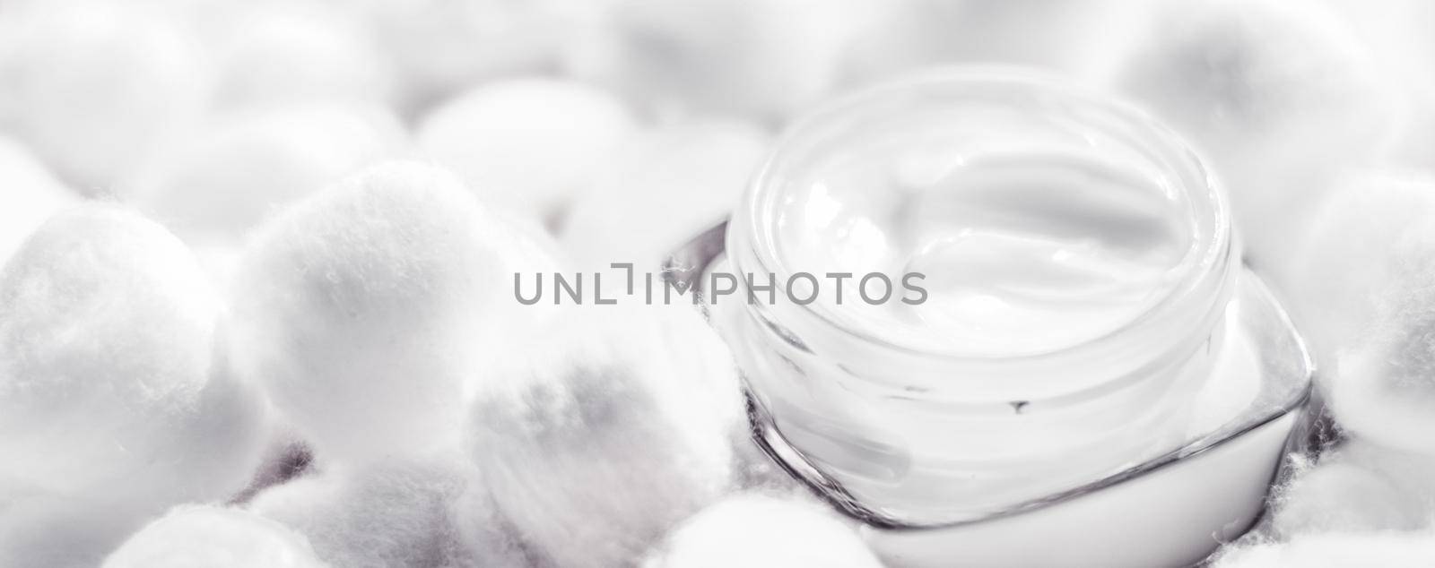 Cosmetic branding, moisturizing emulsion and facial care concept - Luxury face cream for sensitive skin and white cotton balls on background, spa cosmetics and natural skincare beauty brand product