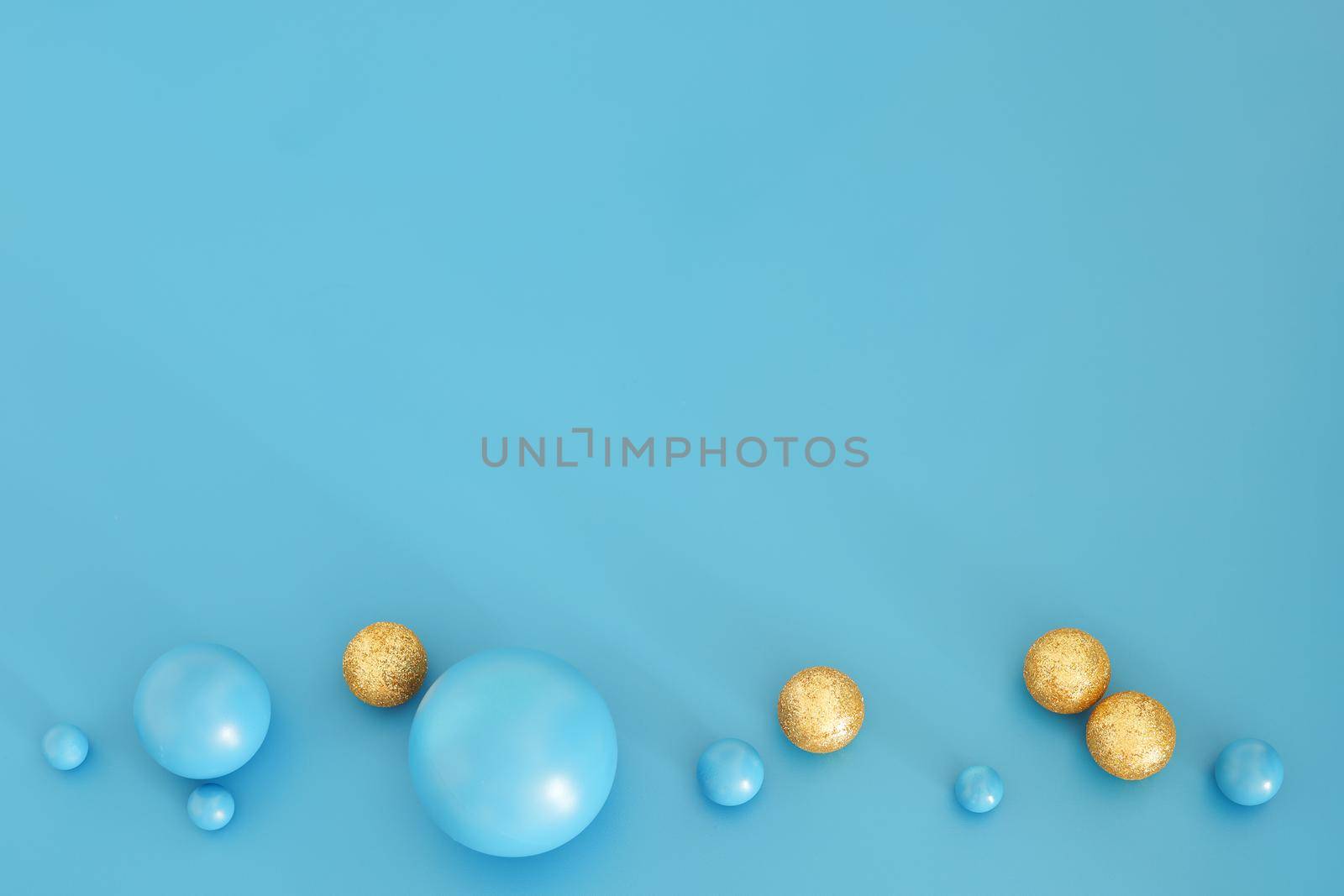 Blue Christmas composition. Trendy Xmas background, mockup. Modern design. Free space for text, copy space. Flat lay, top view.