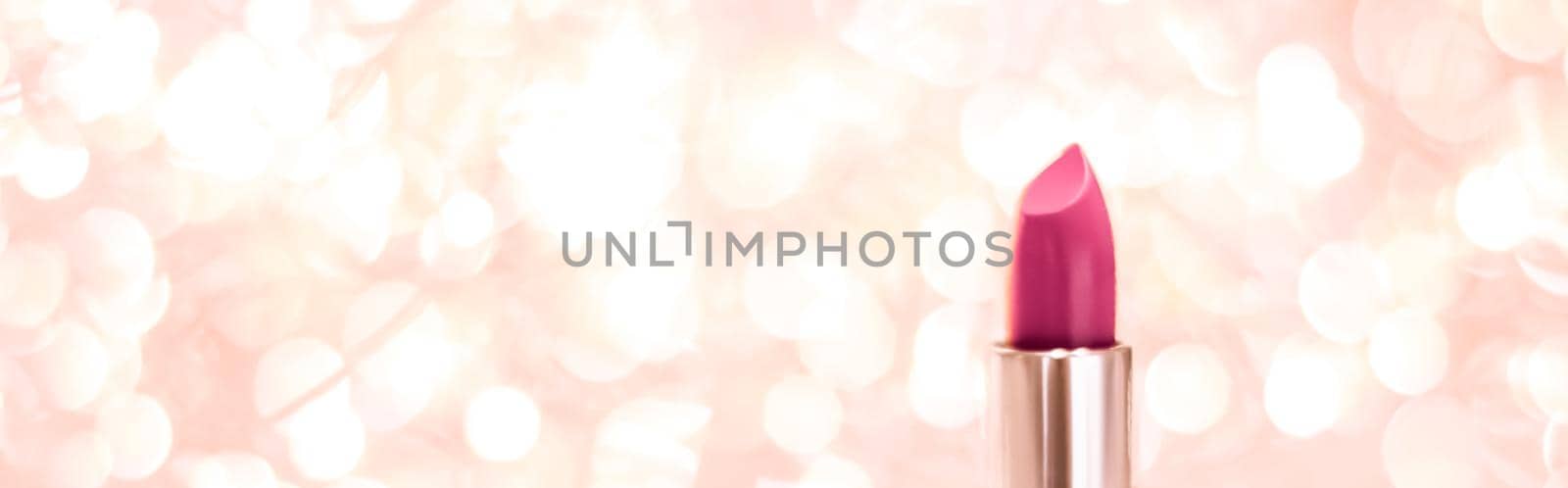 Cosmetic branding, sale and glamour concept - Pink lipstick on rose gold Christmas, New Years and Valentines Day holiday glitter background, make-up and cosmetics product for luxury beauty brand