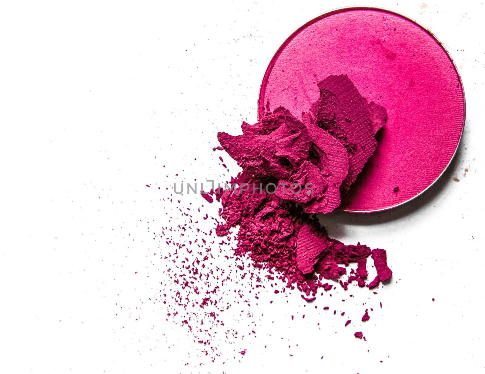 Beauty texture, cosmetic product and art of make-up concept - Crushed eyeshadow palette close-up isolated on white background