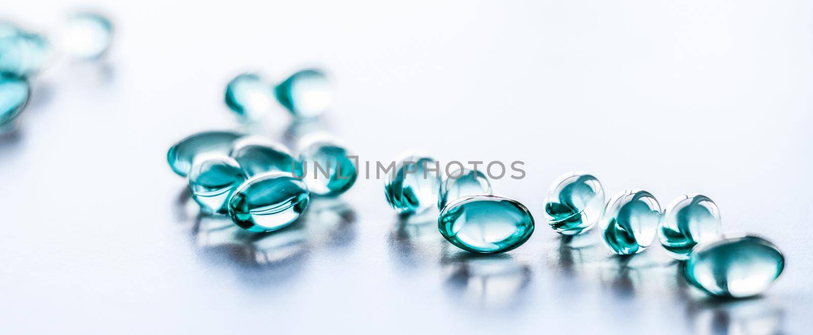 Pharmaceutical, branding and science concept - Blue pills for healthy diet nutrition, supplements pill and probiotics capsules, healthcare and medicine as pharmacy and scientific research background