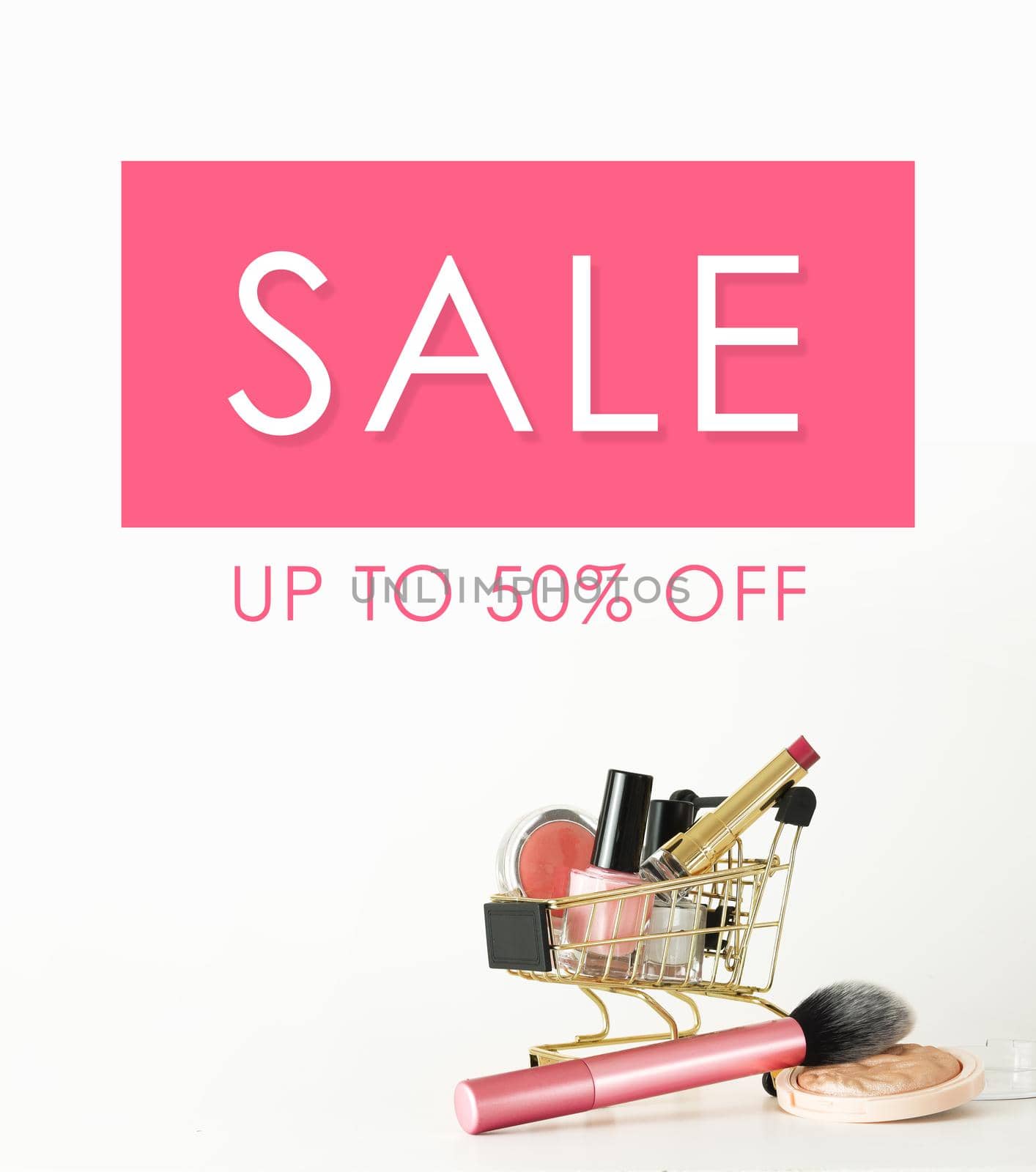 Sale banner. Shopping trolley full of make up and cosmetic goods on white background. Black friday concept. Sale and discount. Goods for women. Closeup of a basket with products for make-up. by creativebird