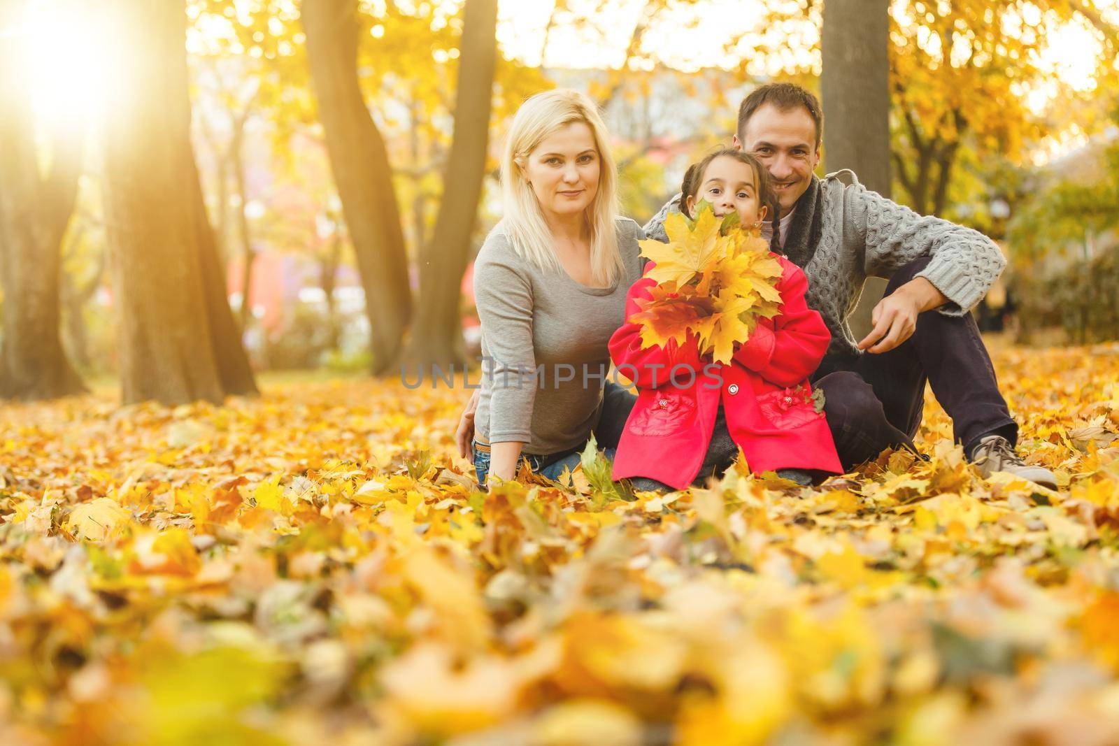family in the autumn park, forest. by Andelov13