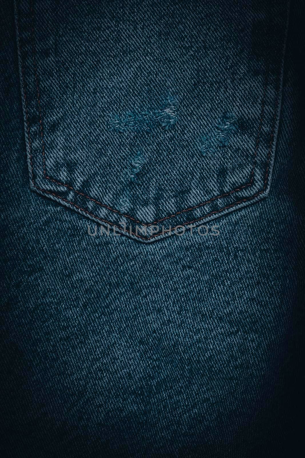 Jeans texture with pocket. Highly detailed closeup of blue jeans. Cool background.