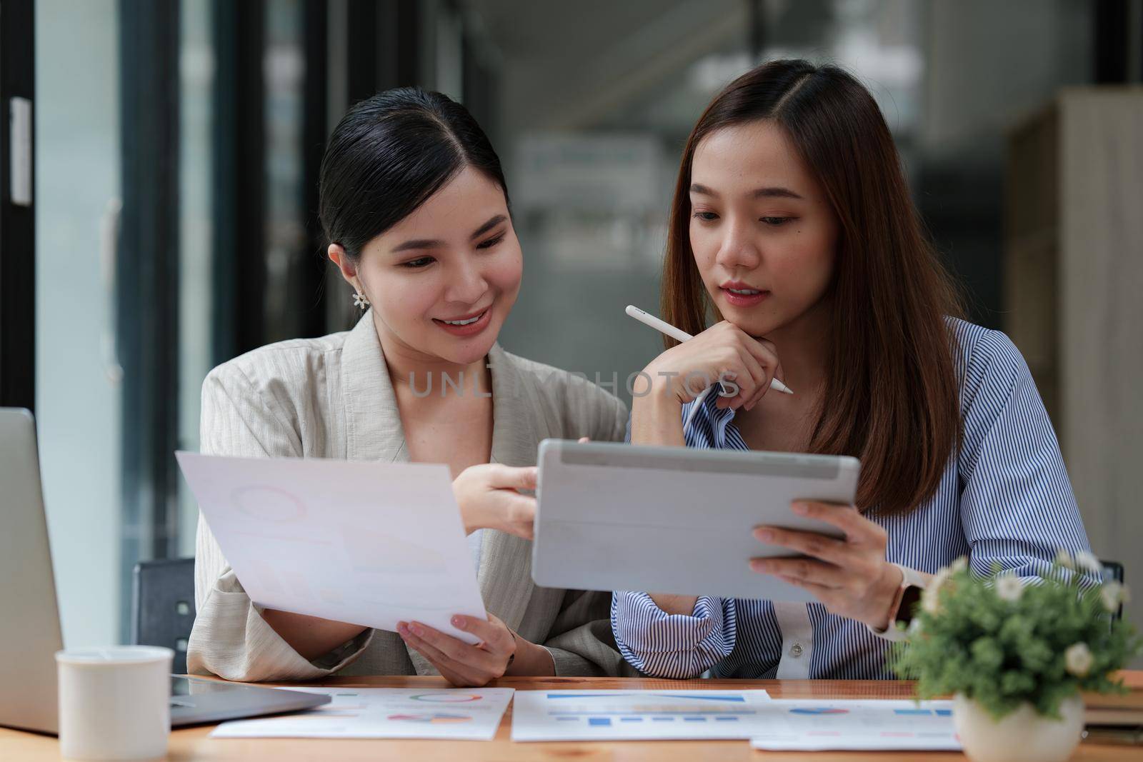 Financial Analyst discussing with Investment Banker at Meeting Room. Fund investment concept.