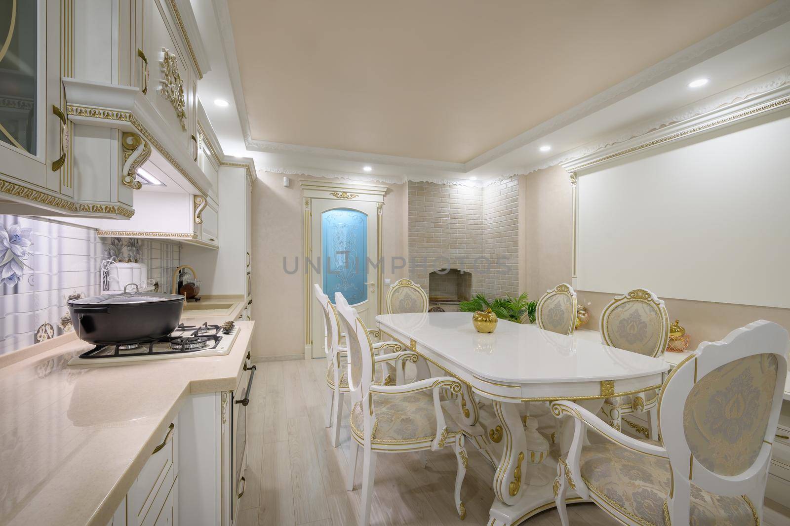 Interior renovation showcase of rich classic white kitchen
