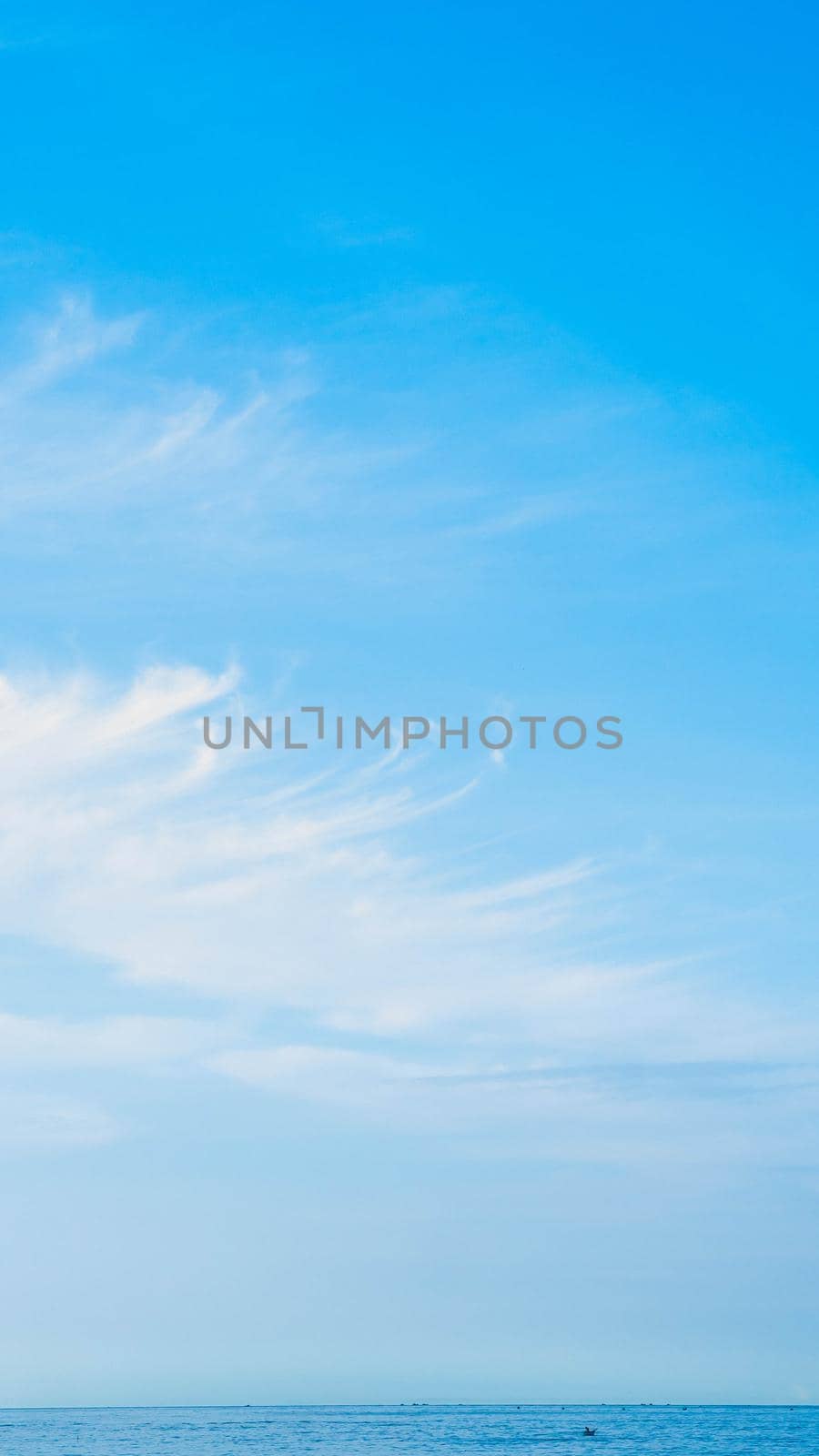 BANNER, VERTICAL STORY Atmosphere panorama white cloud clear blue sky horizon line calm empty sea. Concept paradise life. Design relax wallpaper background. More tone format in stock.