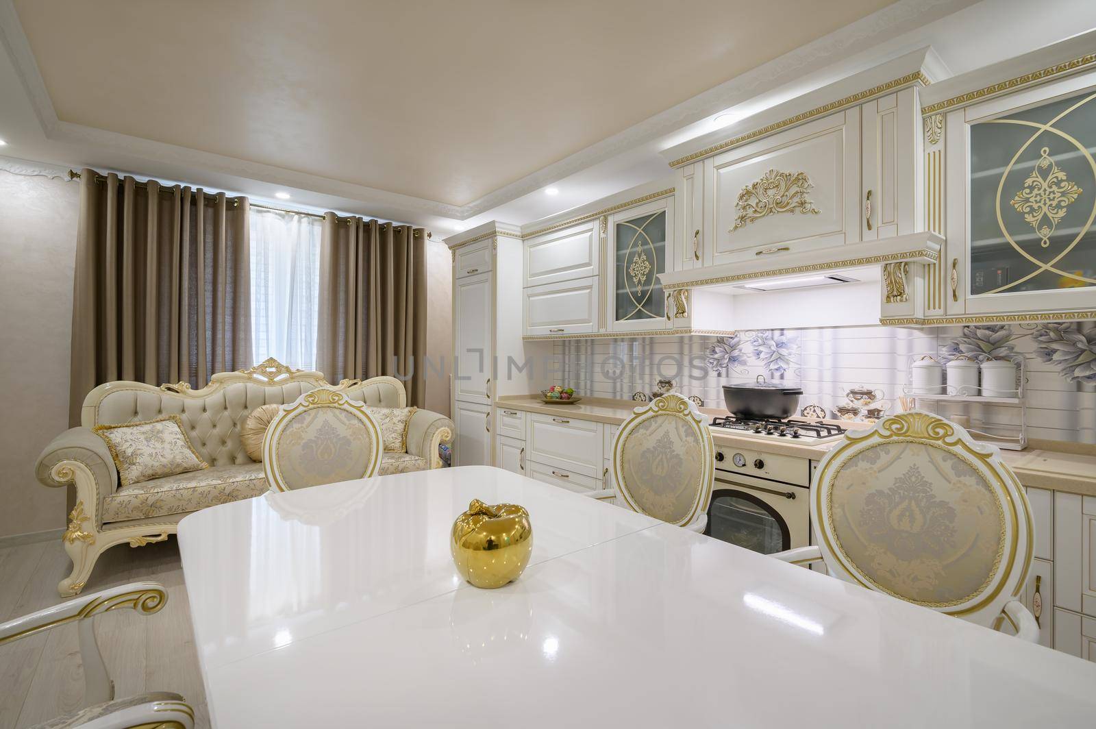 Interior renovation showcase of rich classic white kitchen