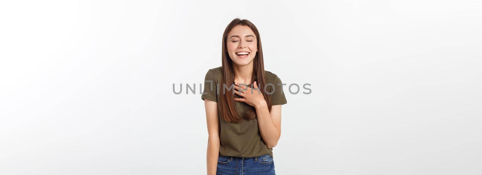 Happy woman Laughing. Closeup portrait woman smiling with perfect smile isolated grey background. Positive human emotion.
