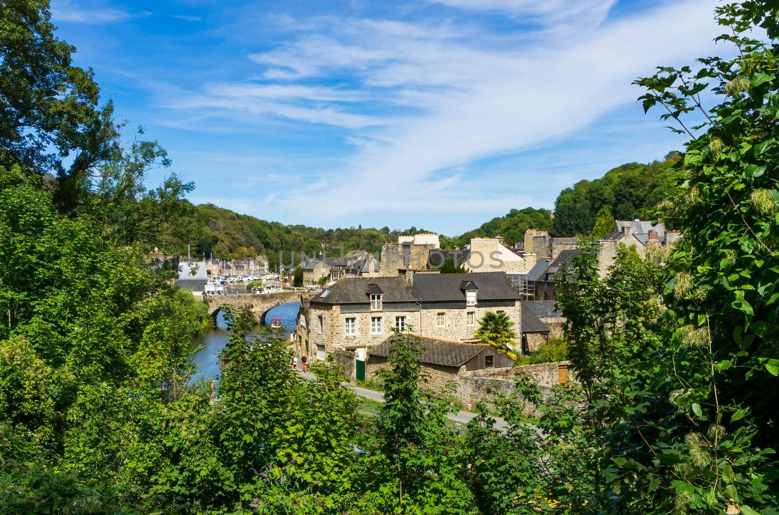 Panoramic view of the old harbour of the French town of Dinan on a sunny summer day.