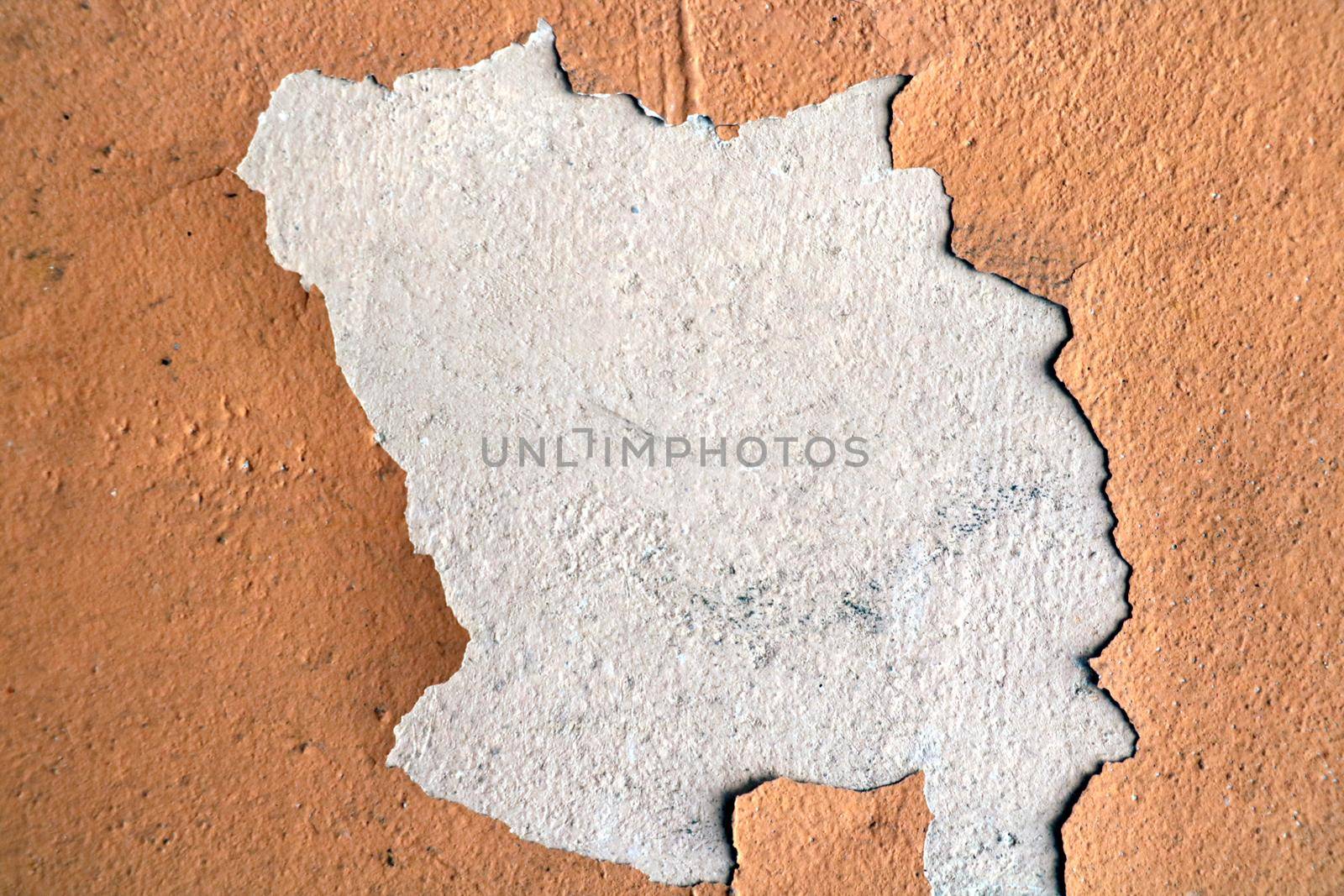 Concrete wall with peeling paint. Place for text. Background