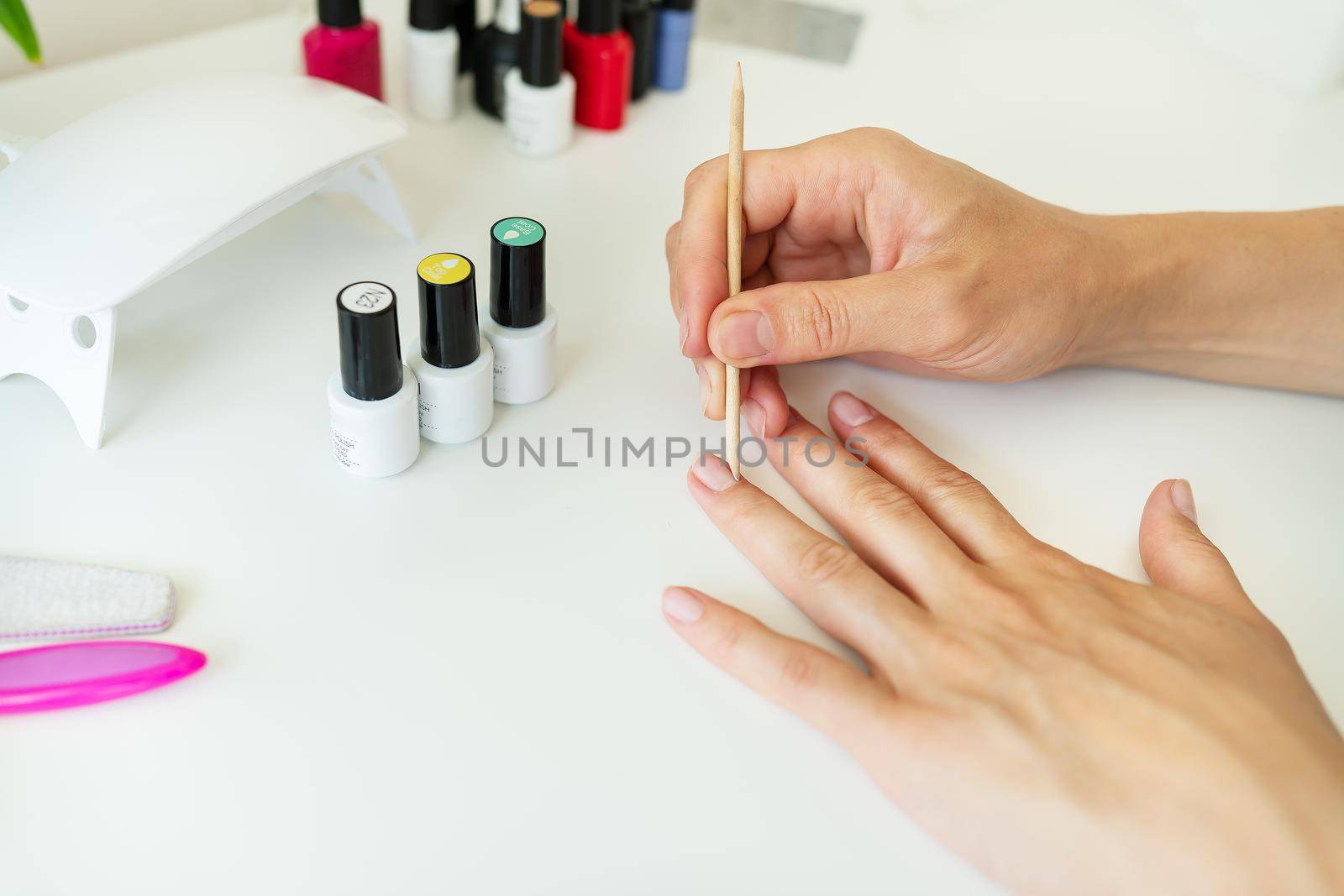 Covering your nails with gel polish at home, your own master, clean the cuticles. Professional hand care, home spa
