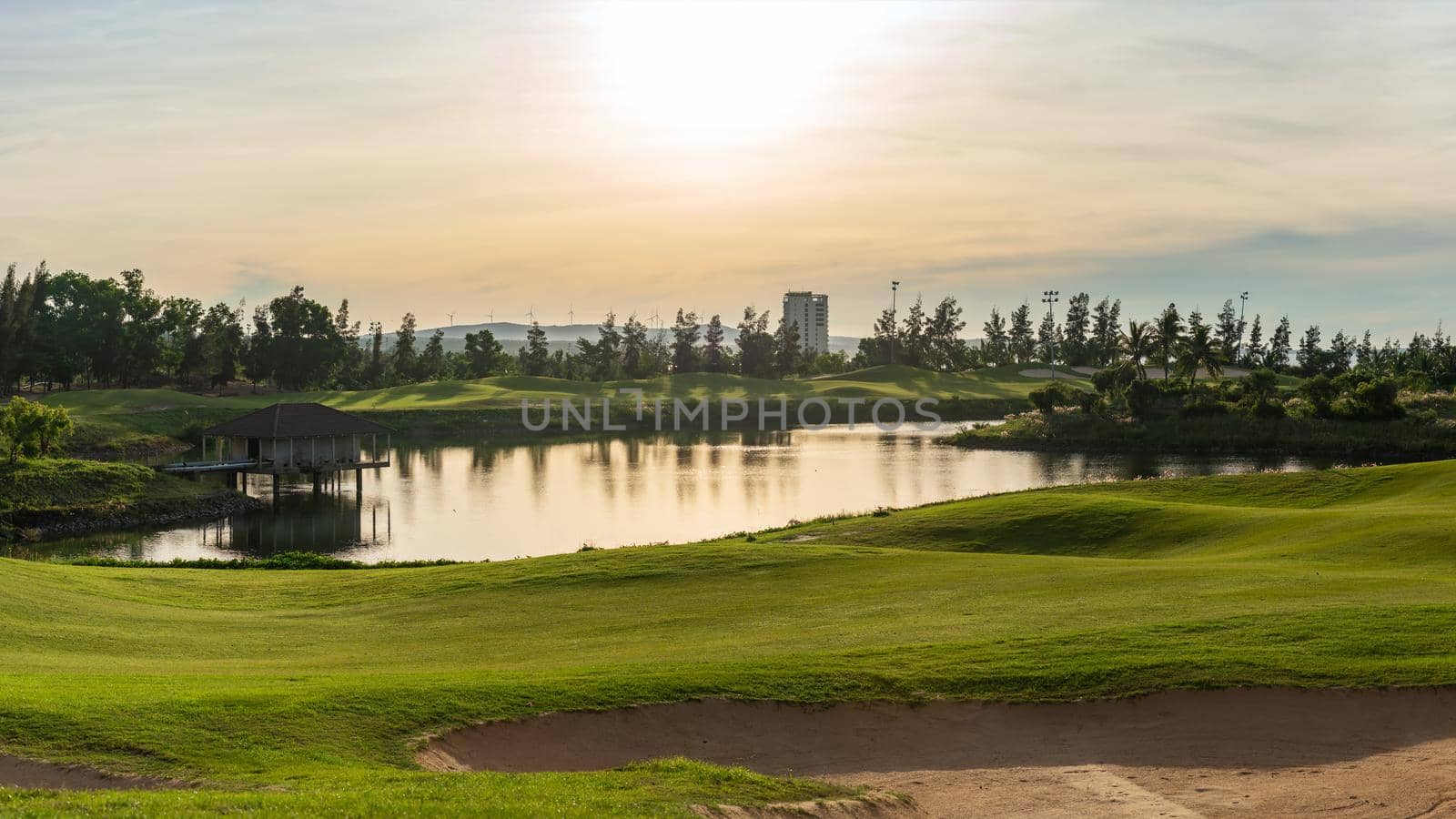 BANNER Orange red dawn sun sky golf pond water reflection hills green fabulous background wallpaper.