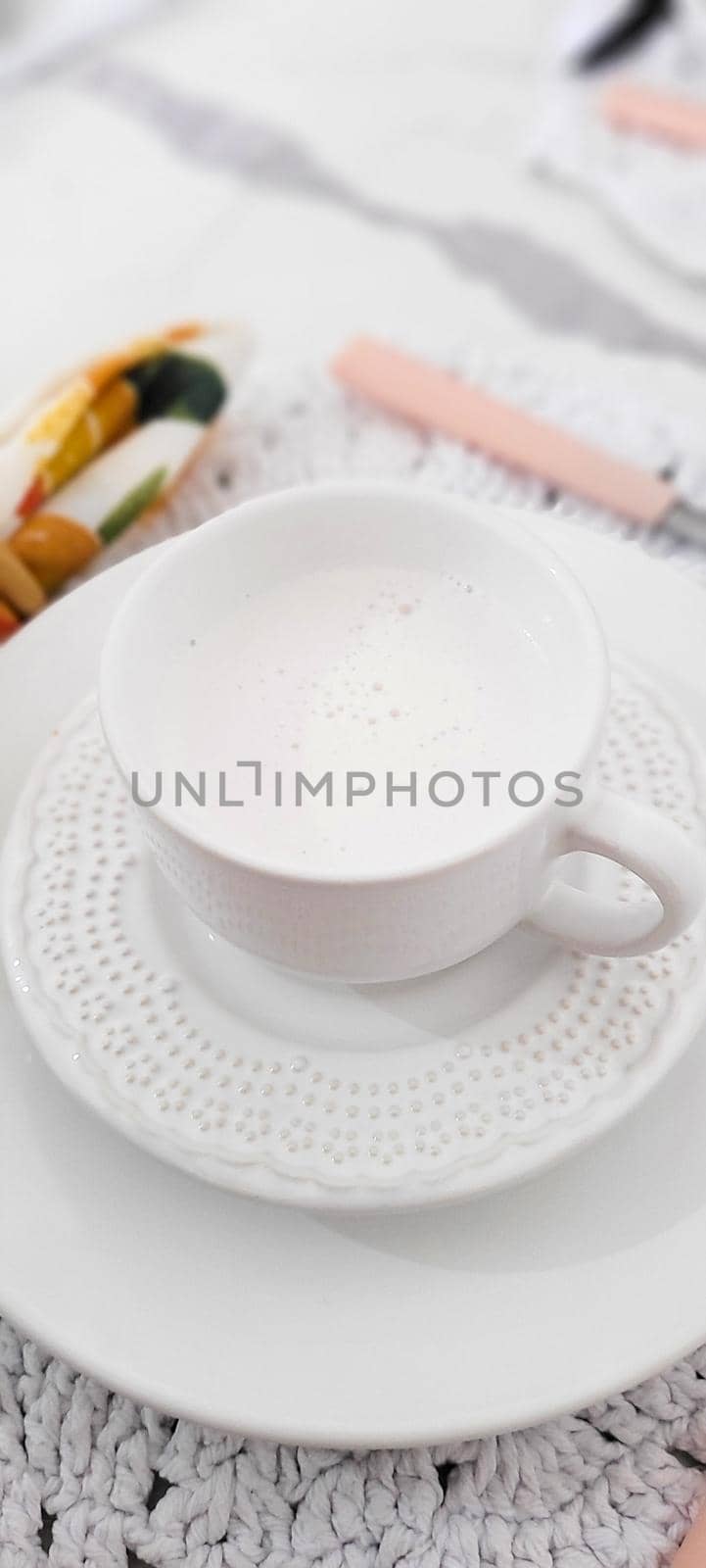 breakfast table with coffee and food