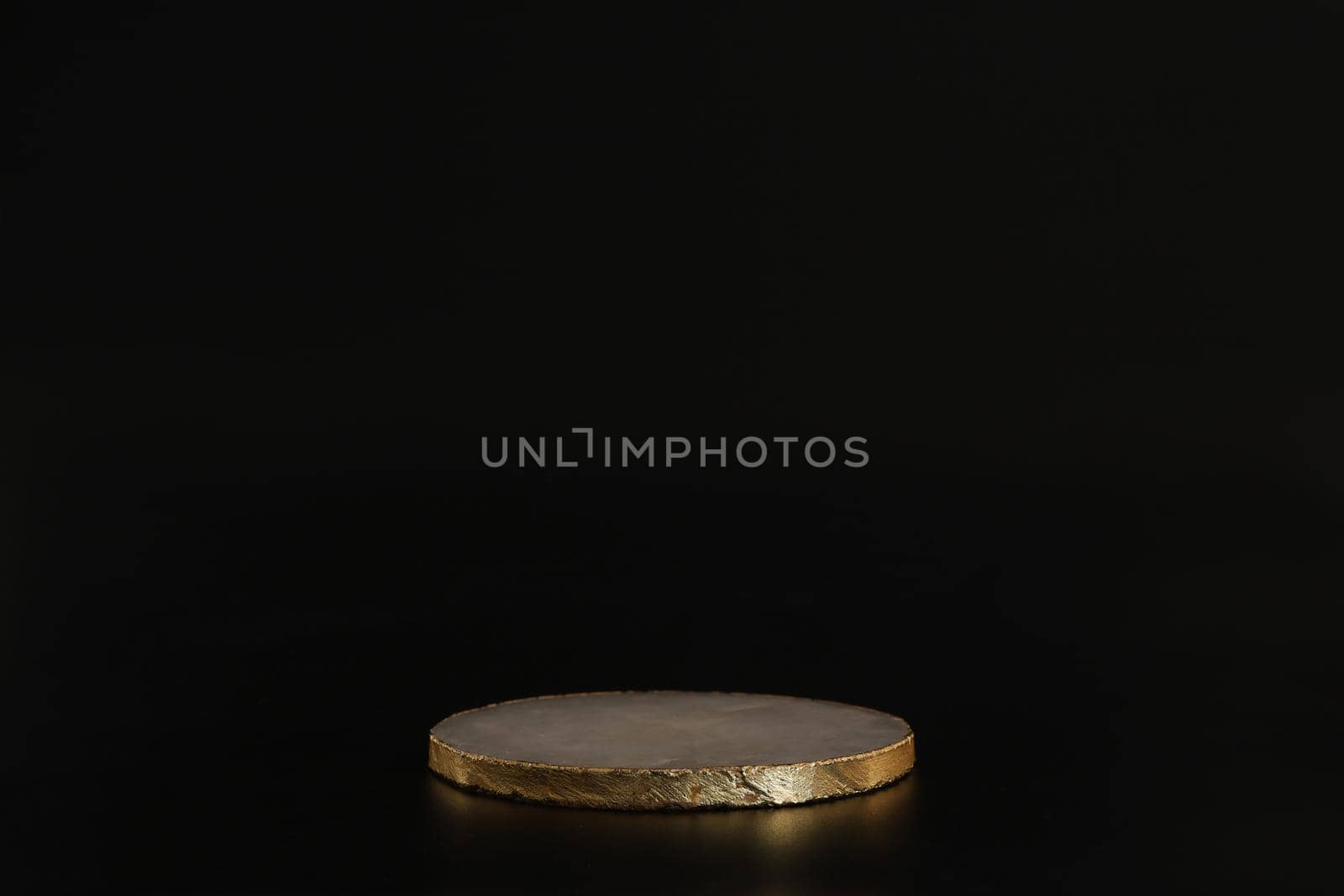 Marble podium with gold on the black background. Podium for product, cosmetic presentation. Creative mock up. Pedestal or platform for beauty products. by creativebird