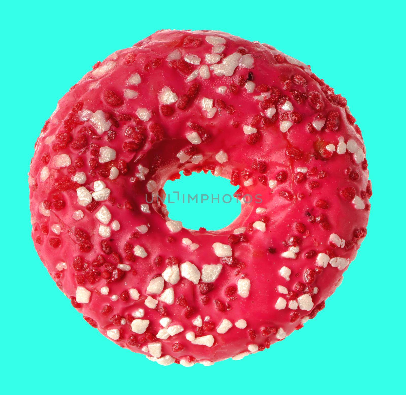 lush donut covered with cream, on a blue background in isolation