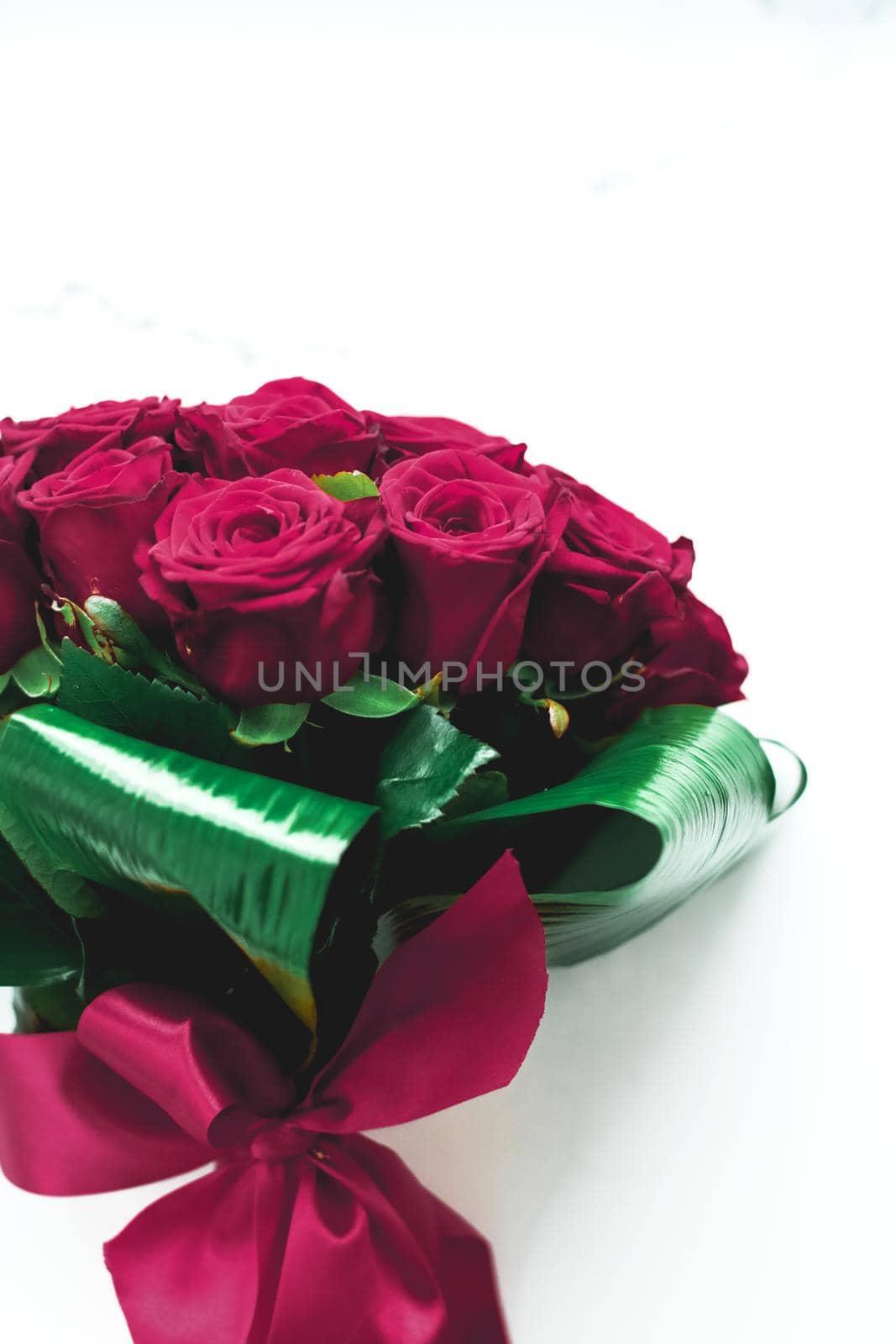 Gift for her, romantic relationship and floral design concept - Luxury bouquet of burgundy roses on marble background, beautiful flowers as holiday love present on Valentines Day