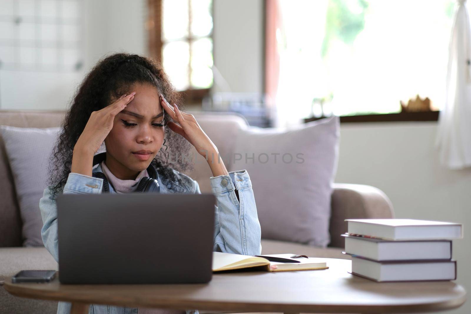 Work from home, Young asian woman struggle with laptop computer, Frustrated asia girl looking at laptop while studying online class, online business, e learning, People struggle with technology.
