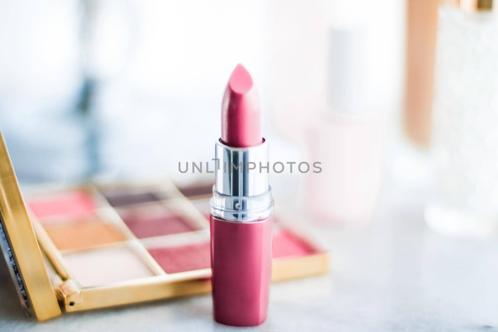 Cosmetic branding, girly and glamour concept - Cosmetics, makeup products on dressing vanity table, lipstick, foundation base, nailpolish and eyeshadows for luxury beauty and fashion brand ads design