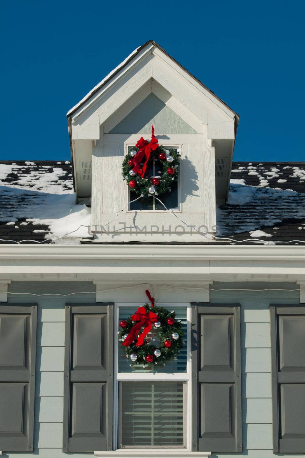 House decorated for winter holidays.