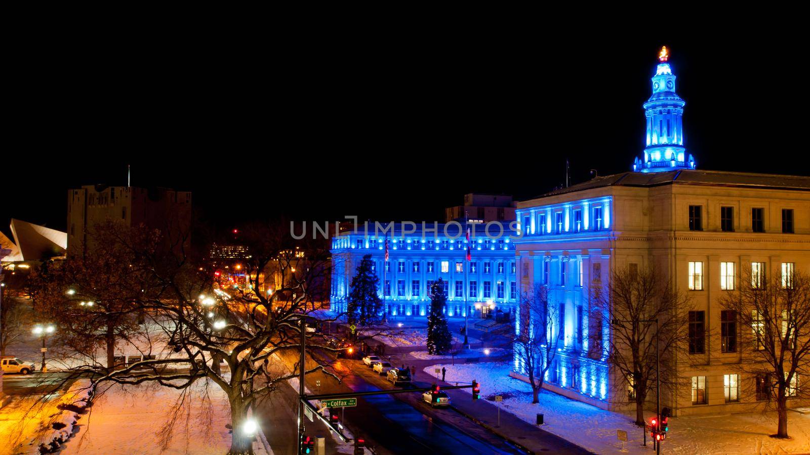Downtown Denver at Christmas. Denver's City and County building decorated with holiday lights.