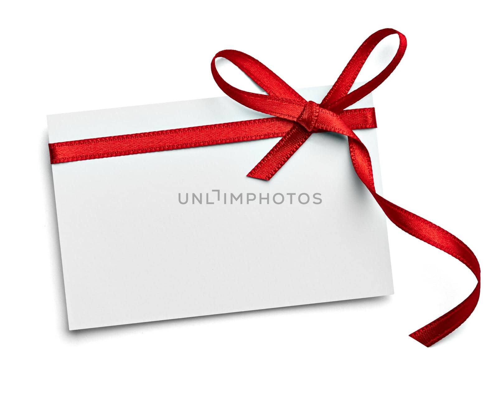 close up of a note card with ribbon bow on white background