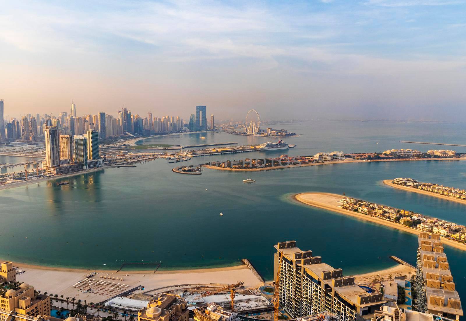 Dubai, UAE - 09.24.2021 Dubai city skyline on early morning hour. Dubai Marina and partial view of Palm Jumeirah.