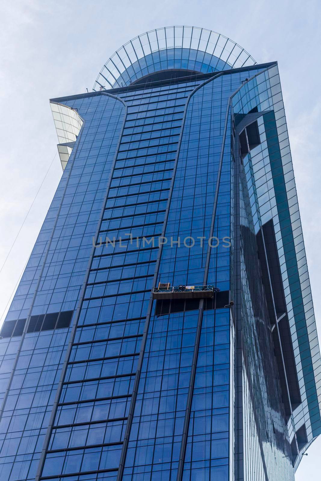 Dubai, UAE - 09.24.2021 External glass cleaning of The View at The Palm.
