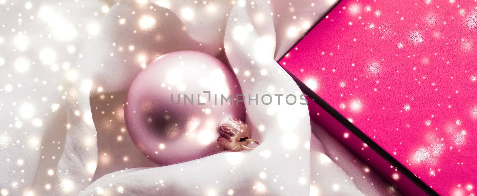 Holidays branding, glamour and decoration concept - Christmas magic holiday background, festive baubles, pink vintage gift box and golden glitter as winter season present for luxury brand design