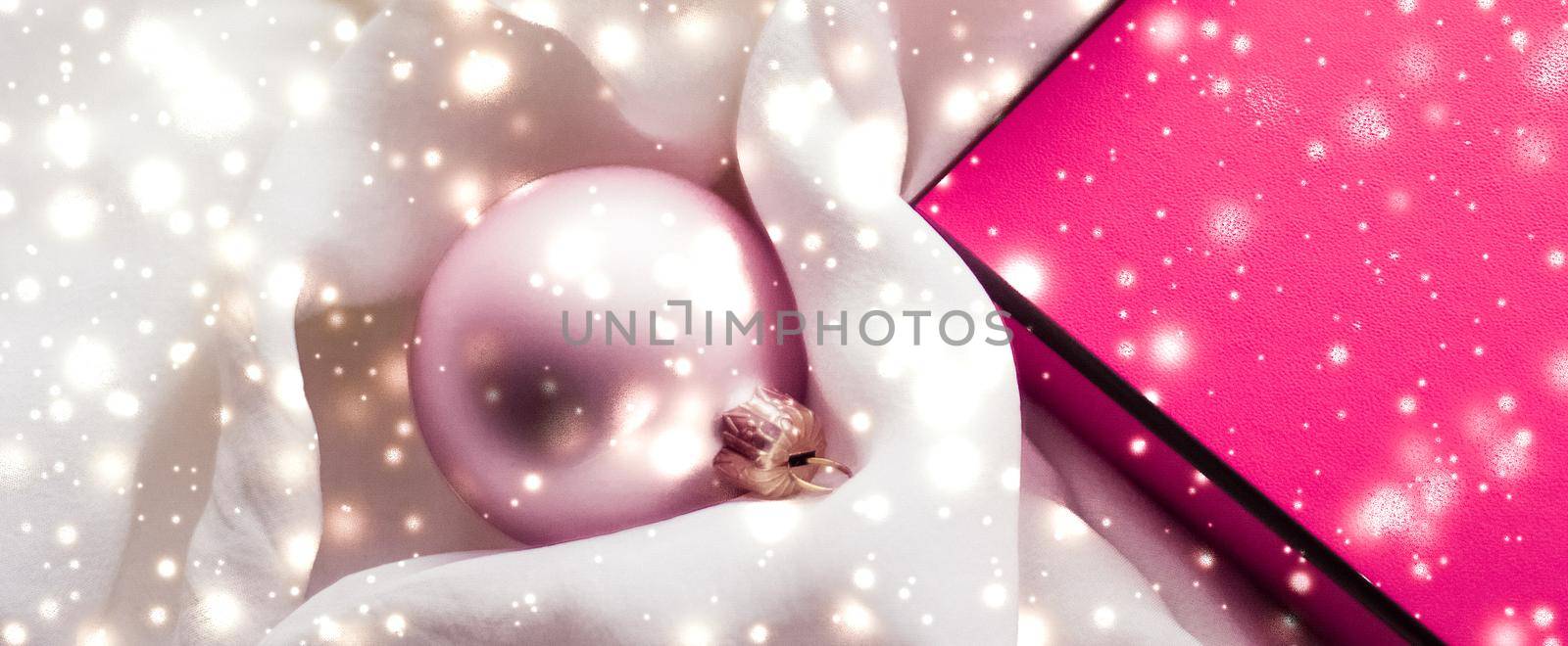 Christmas magic holiday background, festive baubles, pink vintage gift box and golden glitter as winter season present for luxury brand design by Anneleven