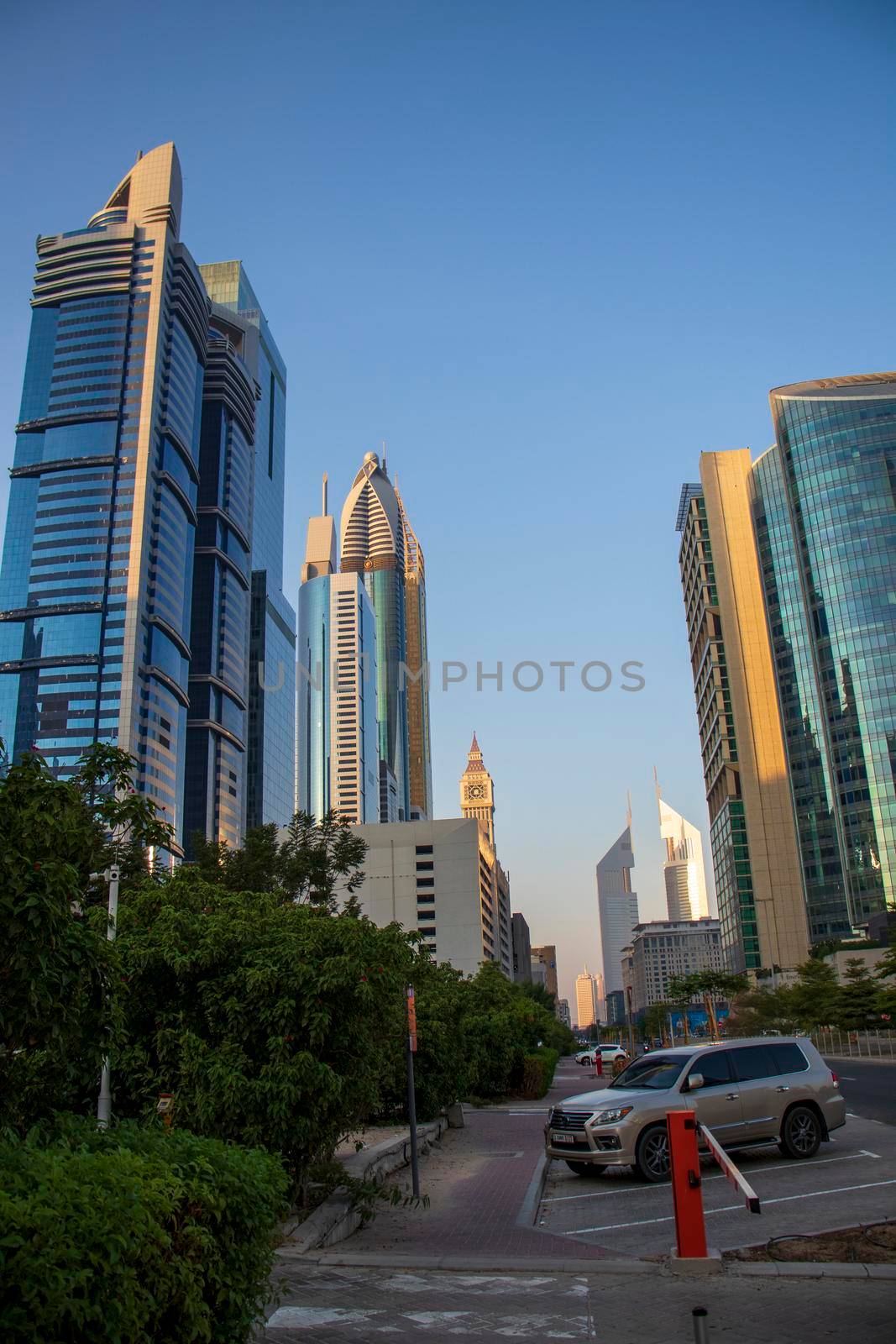 Dubai Financial Center road. Landmarks such Jumeirah Emirates towers, Ritz Carlton, DIFC on the picture. Outdoors