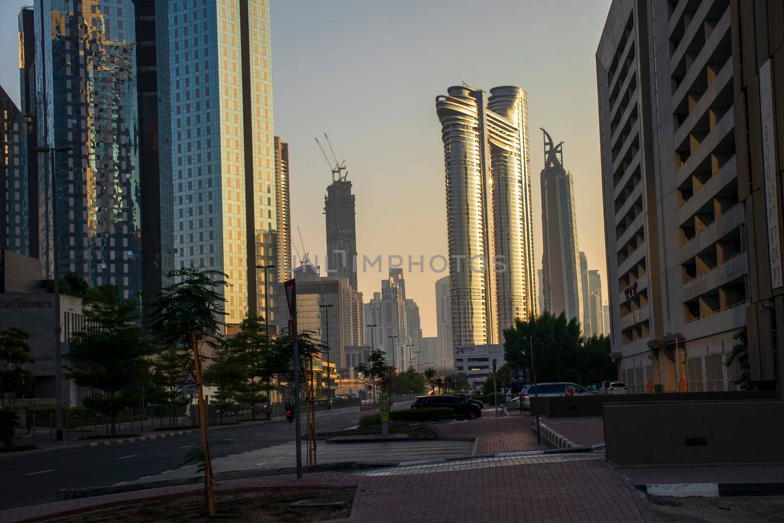Dubai Financial Center road. Address Sky view hotel can be seen on the scene. Outdoors