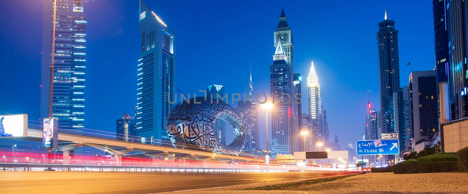 Main road of a United Arab Emirates, Shekh Zayed road. Shot taken in Dubai. Many of famous buildings can be seen as well as metro station and "Museum of future" by pazemin