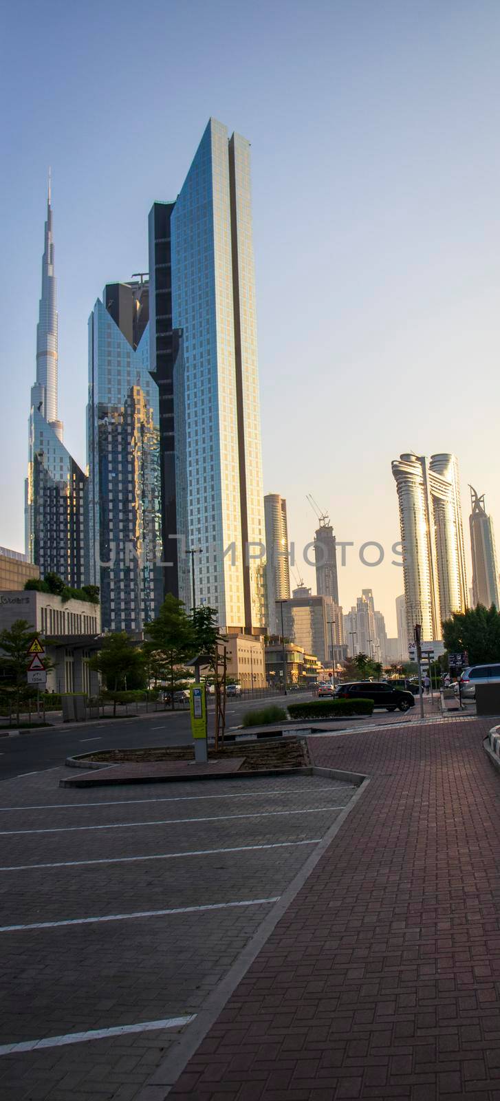 Dubai Financial Center road. Address Sky view hotel and Burj Khalifa tallest building in the world can be seen on the scene. Outdoors