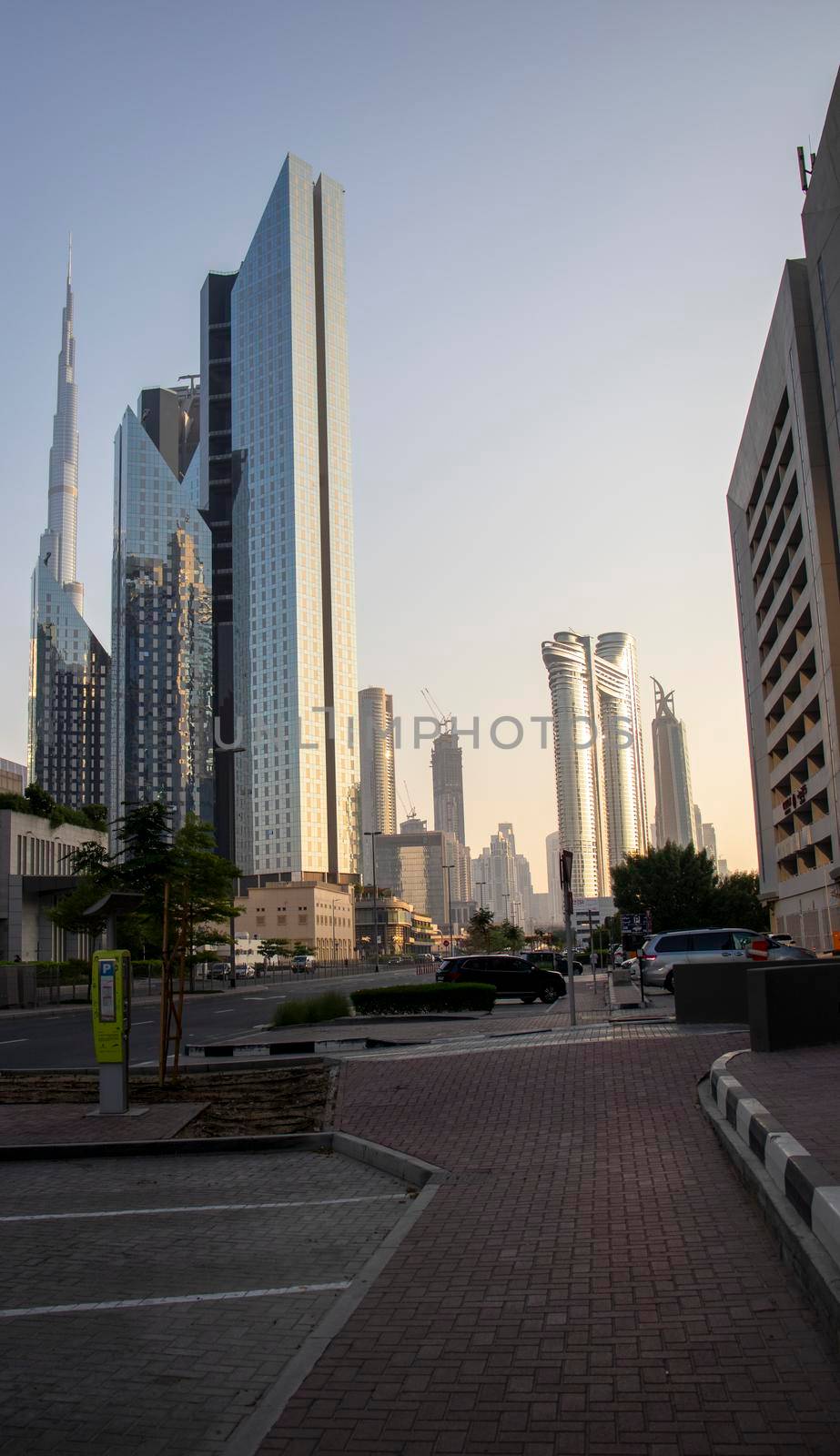 Dubai Financial Center road. Address Sky view hotel and Burj Khalifa tallest building in the world can be seen on the scene. Outdoors