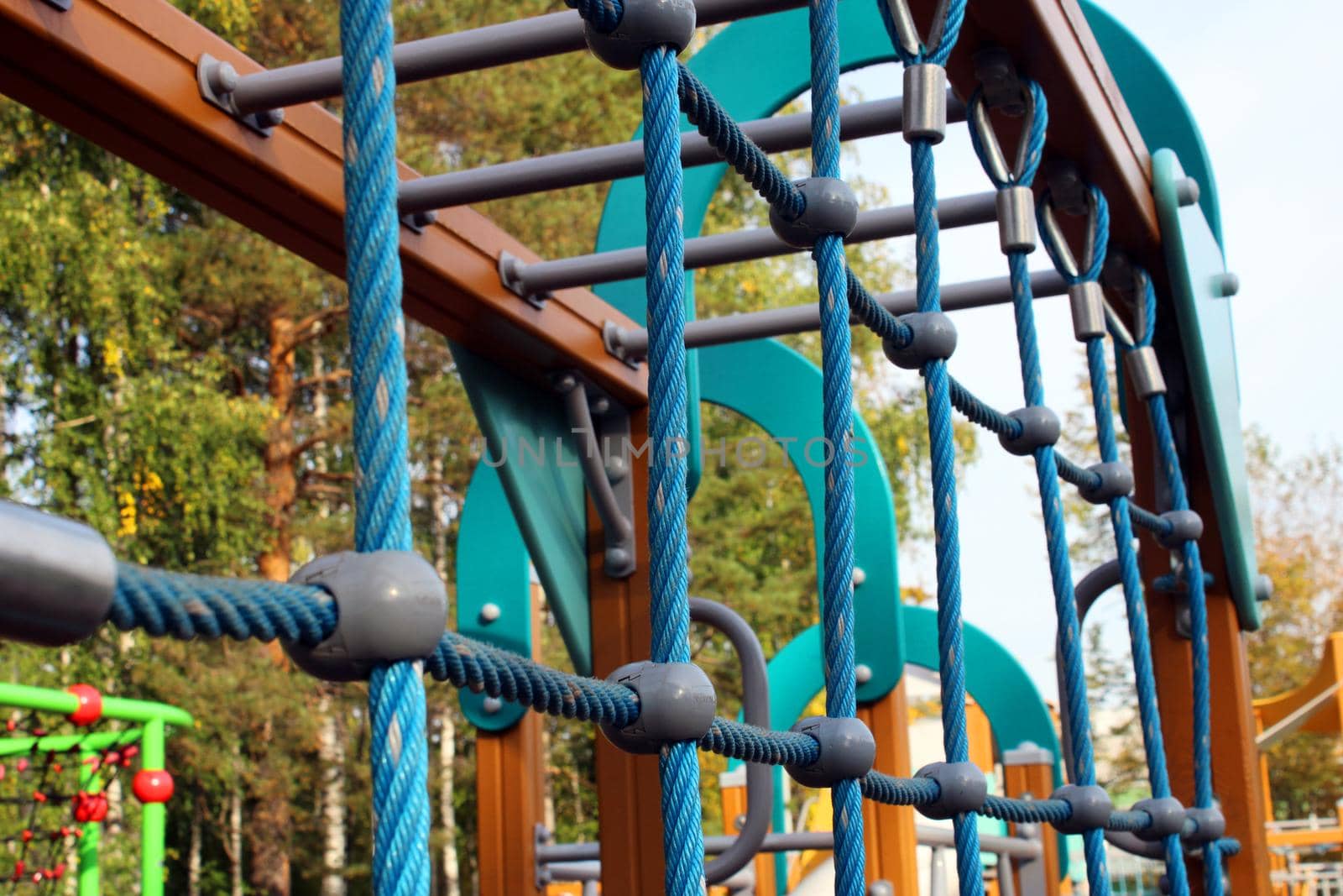 Children's playground with sports equipment in the city park. The concept of a healthy lifestyle.