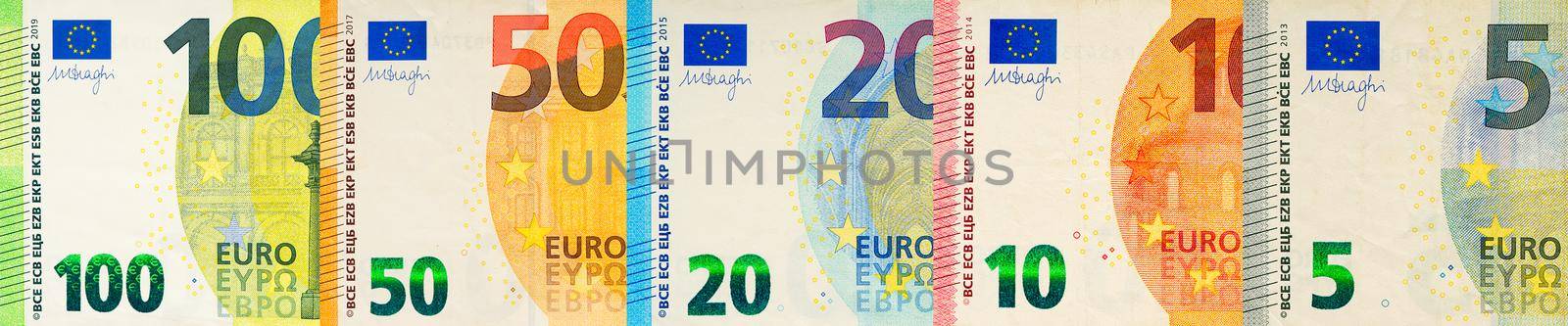Euro banknotes creative layout. Background from European banknotes, euro. euro money of different denominations abstract background